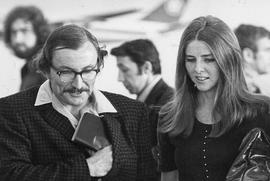 Photograph of English teacher Maurice Farge and his wife Brenda waiting at Toronto International ...