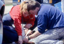 Photographs of students from the paramedics program providing care