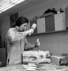 Photograph of Angela Fina sculpting