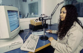 Photograph of student in the Humber radio broadcasting studio