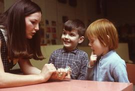 Early Childhood Education (ECE) Student with children : [photograph]
