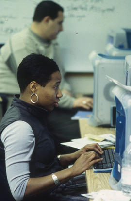 Photograph of students seated at the computer