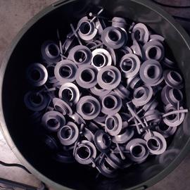 Photograph of a bin with plastic parts