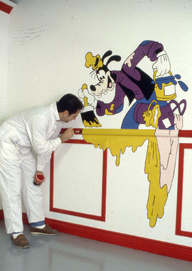 Photograph of a mural being painted