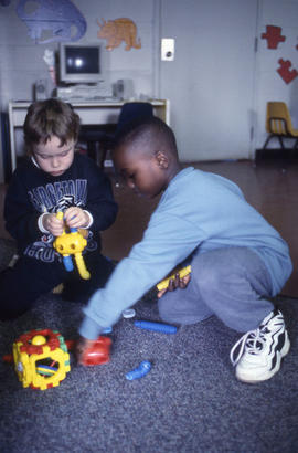 Photograph of children playing with toys