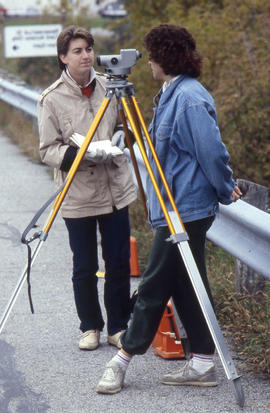 Photograph of students setting up survey equipment