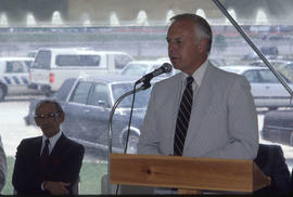 Photograph of a dignitary speaking at the Demonstration Gardens opening ceremony