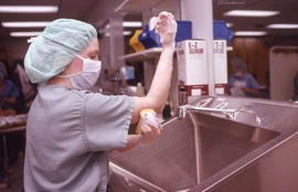 Photograph of an Operating Room Nurse student preparing for a training exercise