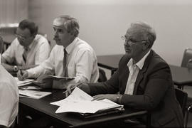 Photograph of showcase attendees in a classroom during a session