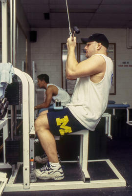 A photograph of students using fitness equipment