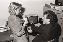 Photograph of a person using the word processing machine