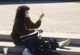 Photograph of a Student Looking at a Projector Slide