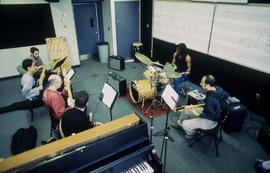 Photograph of professor Ed Quinlan and his music students