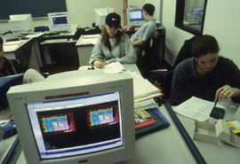 Photograph of students working on Architectural drafting assignments