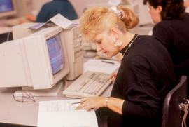 Photograph of a student working at a computer