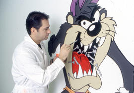Photograph of a wall art of the Tasmanian Devil being painted