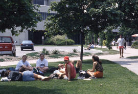 Photograph of Students Sitting on the Lawn