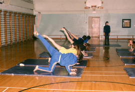 Photograph of students exercising in gymnasium