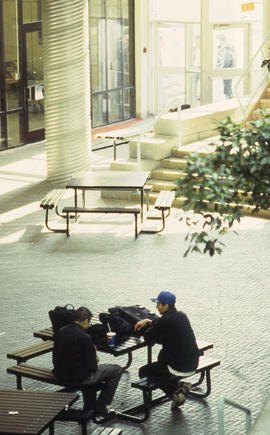 A photograph of two students in the Student Centre
