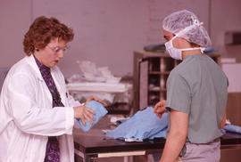 Photograph of Susan Schulte instructing an Operating Room Nurse exercise