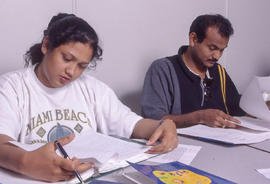 Photograph of two students working next to each other