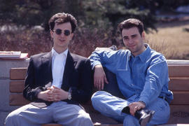 Photograph of Two Men Sitting on a Bench
