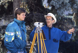 Photograph of an Instructor Talking to Their Student