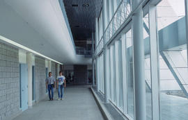 Photograph of People Walking Down a Hallway in the N Building