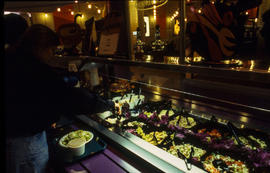 A photograph of students at the salad bar in the Food Emporium