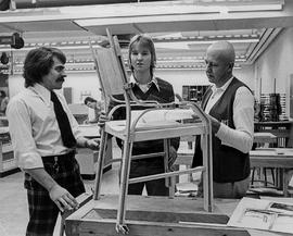 Photograph of Timothy Stanley and Ken Cummings Analyzing a Chair with a Student