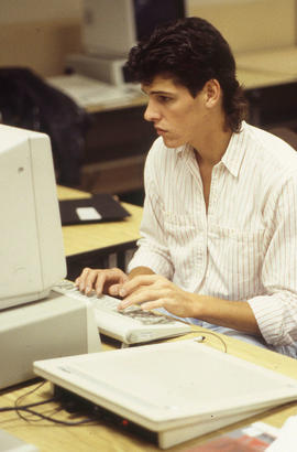 Photograph of a student working at a computer