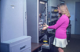 Photograph of a student using an Audio Console at the Instructional Materials Centre