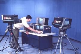 Jerry Millan working on IMC TV : [photograph]