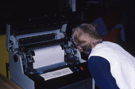 Photograph of Caroline Betsch monitoring the printer