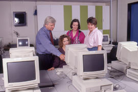 Photograph of staff in the HRT computer lab