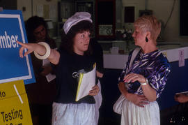 Photograph of an Unknown Person Being Directed by Staff at the Assessment Testing Reception