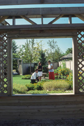 Photograph of Visitors Sitting in the Demonstration Gardens