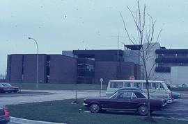 View of J building and period cars : [photograph]