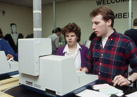 Photograph of Hotel and Restaurant training using customer billing equipment