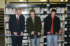 President Squee Gordon and student council members cut the ribbon at opening of the Lakeshore Lib...