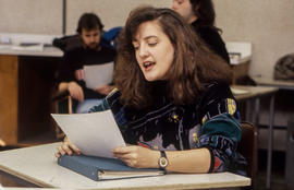 Photograph of Theatre students rehearsing from a script