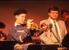 Photograph of a student musician playing a trumpet