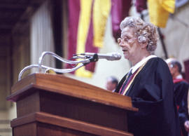 Photograph of Doris Tallon speaking at a convocation ceremony