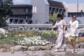 Photograph of Two People Entering the Arboretum