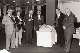 Photograph of Igor Sukor, Larry Holmes and guests in the Humber room