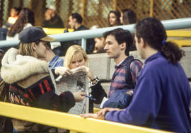 Photograph of a huddle of students in the Student Centre