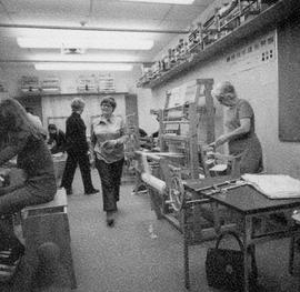 Photograph of Weaving Students Working with Looms
