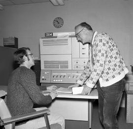 Photograph of two students in the first computer room in the D building