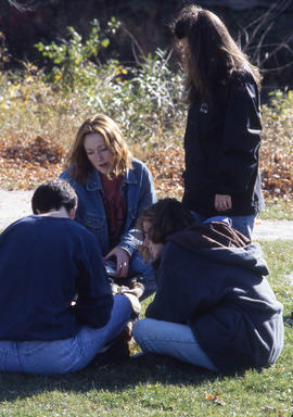 Photograph of Civil Engineering students completing work outside on campus
