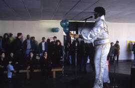 Photograph of Students Watching an Elvis Impersonator